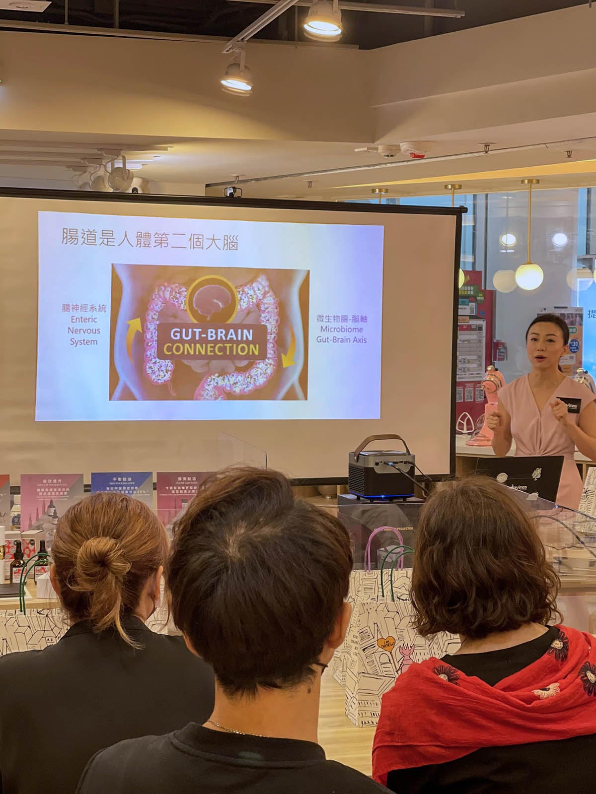 Mellissa Cheung presenting the gut-brain connection at a Davines event
