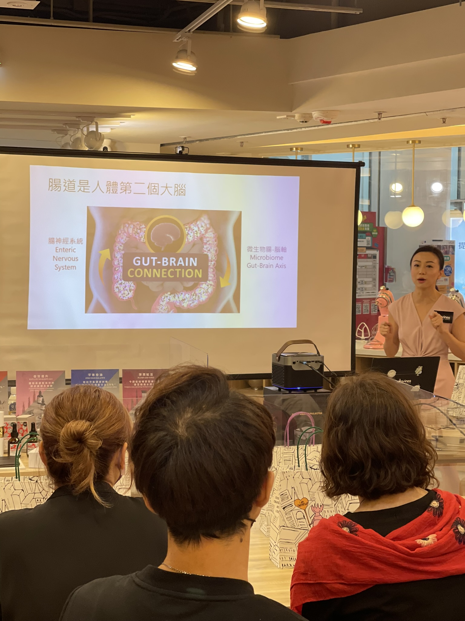 Mellissa Cheung presenting the gut-brain connection at a Davines event